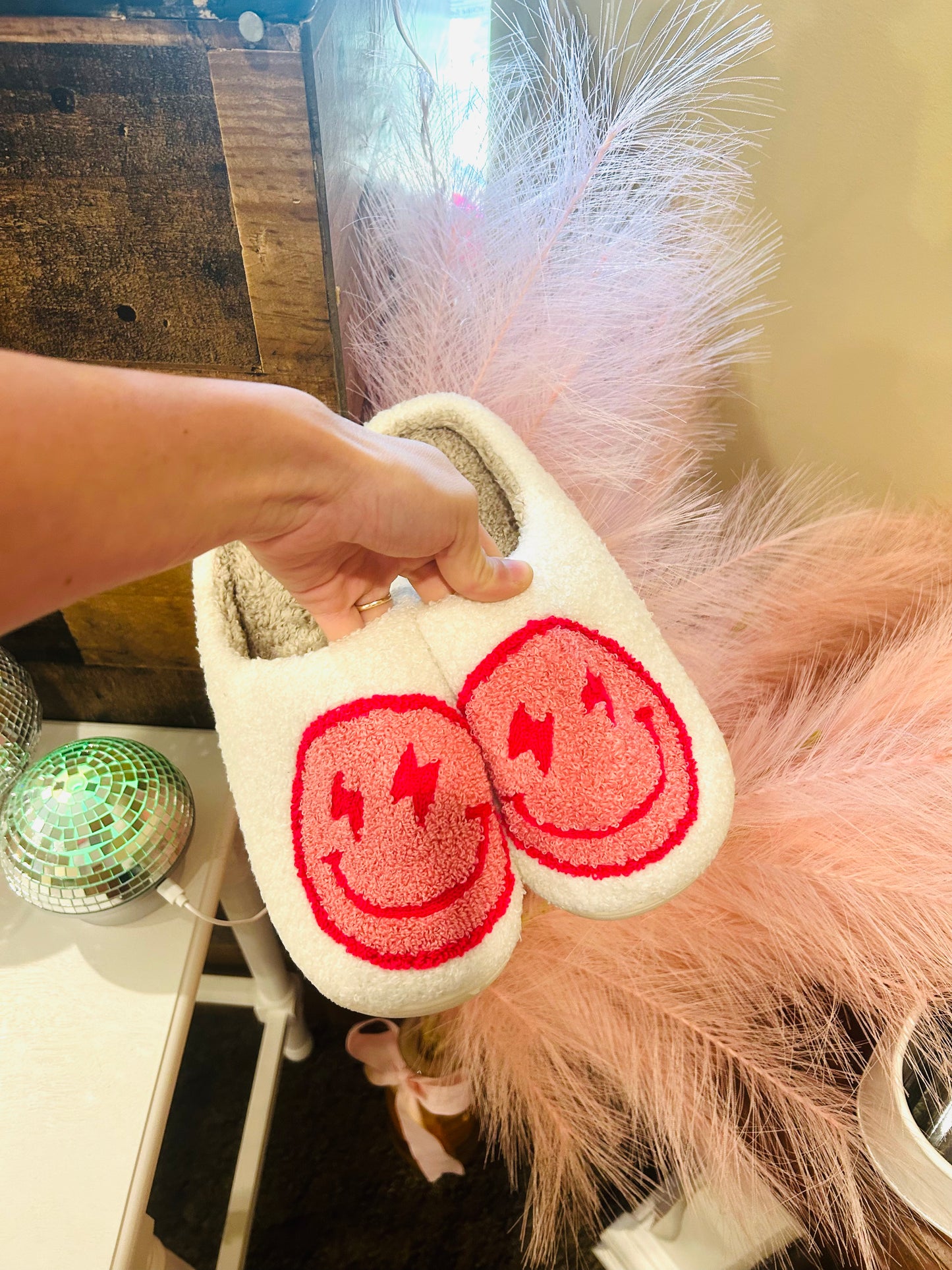 pink smiley slippers